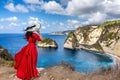 Woman standing on Diamond beach in Nusa penida island, Bali in Indonesia. Royalty Free Stock Photo