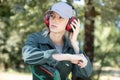 woman standing with ear protection outdoors Royalty Free Stock Photo