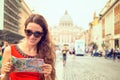 Woman standing in front of basilica di san pietro in vatican city Royalty Free Stock Photo