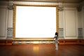 Woman standing in front of and looking at big blank painting canvas with huge frame