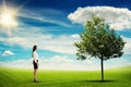 Woman standing on green meadow Royalty Free Stock Photo