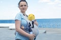 woman standing with her baby in sling Royalty Free Stock Photo