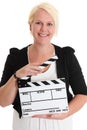 Woman standing holding a movie slate Royalty Free Stock Photo