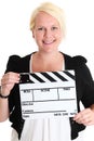 Woman standing holding a movie slate Royalty Free Stock Photo