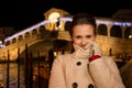 Woman standing near Rialto Bridge in Christmas Venice, Italy Royalty Free Stock Photo