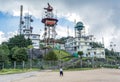 Woman standing near the strategic buildings at the military base Royalty Free Stock Photo