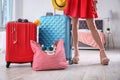 Woman standing near suitcases and bag packed Royalty Free Stock Photo