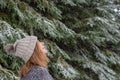 Woman looking up at snow falling Royalty Free Stock Photo