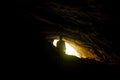 Woman standing in Rawana Ella cave in Sri lanka.