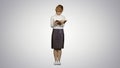 Woman standing and reading book on white background Royalty Free Stock Photo