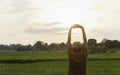 Woman standing for relax in the evening with sunset in nature outdoor