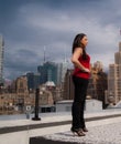 Woman Standing on Rooftop