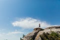 woman traveler standing on top of a mountain looking at the view Royalty Free Stock Photo