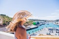 Woman standing at viewpoint over, the Porto de Abrigo de Albufeira, Albufeira Bay in Albufeira, Portugal