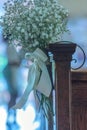 Woman Standing By A Wedding Flower & Wedding Bouquet