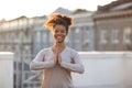 Woman standing in yoga pose on mat and practicing yoga, female meditating indoors Royalty Free Stock Photo