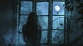 A woman stands with back to the camera framed by a broken window and the ghostly glow of moonlight. appears to be lost