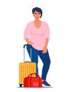 Woman stands beside luggage, ready for travel or commute. Suitcase and travel bag. Concept of adventure, journey, relocation.