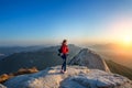 Woman stands on the peak of stone in Bukhansan national park. Royalty Free Stock Photo