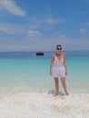 Woman stands at exotic beach whitesand Royalty Free Stock Photo