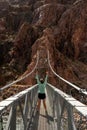 Woman Star Poses On The Silver Bridge In Grand Canyon