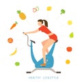 Woman on Stationary Bike with Vegetables and Fruits Royalty Free Stock Photo