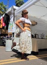 Woman In Steampunk Outfit at Her Sales Booth