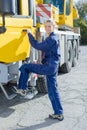 Woman stepping into cab truck Royalty Free Stock Photo