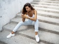 Woman on Steps In City Street Outdoors Royalty Free Stock Photo