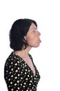 Woman sticking out her tongue on white background Royalty Free Stock Photo