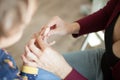 Woman sticks a band-aid son cut finger Royalty Free Stock Photo