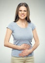 Woman with stomach pain touching tummy. Royalty Free Stock Photo