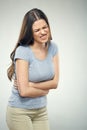 Woman with stomach pain touching tummy. Royalty Free Stock Photo