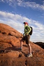 Woman stops while hiking