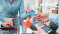 Woman at the store checkout Royalty Free Stock Photo