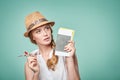 Woman in straw hat holding airplane model in hand Royalty Free Stock Photo