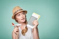 Woman in straw hat holding airplane model in hand Royalty Free Stock Photo