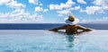 woman with straw hat in infinity swimming pool with sea view at luxury resort. summer vacation background Royalty Free Stock Photo