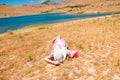 Woman in straw hat lying on dry grass Royalty Free Stock Photo