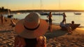 woman with straw hat,people relax on sunset sea beach ,boat on sea water,summer travel vacation Royalty Free Stock Photo