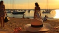 woman with straw hat,people relax on sunset sea beach ,boat on sea water,summer travel vacation Royalty Free Stock Photo