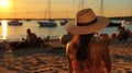 woman with straw hat,people relax on sunset sea beach ,boat on sea water,summer travel vacation Royalty Free Stock Photo