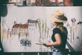 Woman street artist at work painting Royalty Free Stock Photo