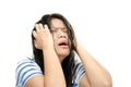 Woman stressed is going crazy pulling her hair in frustration. Royalty Free Stock Photo