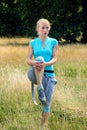 Woman stretches her legs in the park