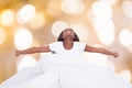 Woman Stretching In Bed Royalty Free Stock Photo