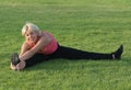 Woman stretching her leg