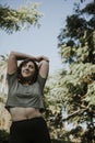 Woman stretching while on a hike Royalty Free Stock Photo
