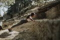 Woman stretching wile on a hike Royalty Free Stock Photo