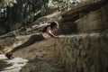 Woman stretching wile on a hike Royalty Free Stock Photo